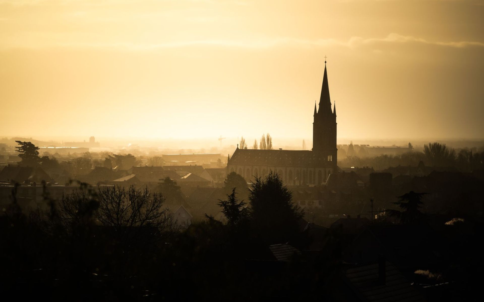 Vue de Cernay - coucher de soleil sur l'église St Etienne